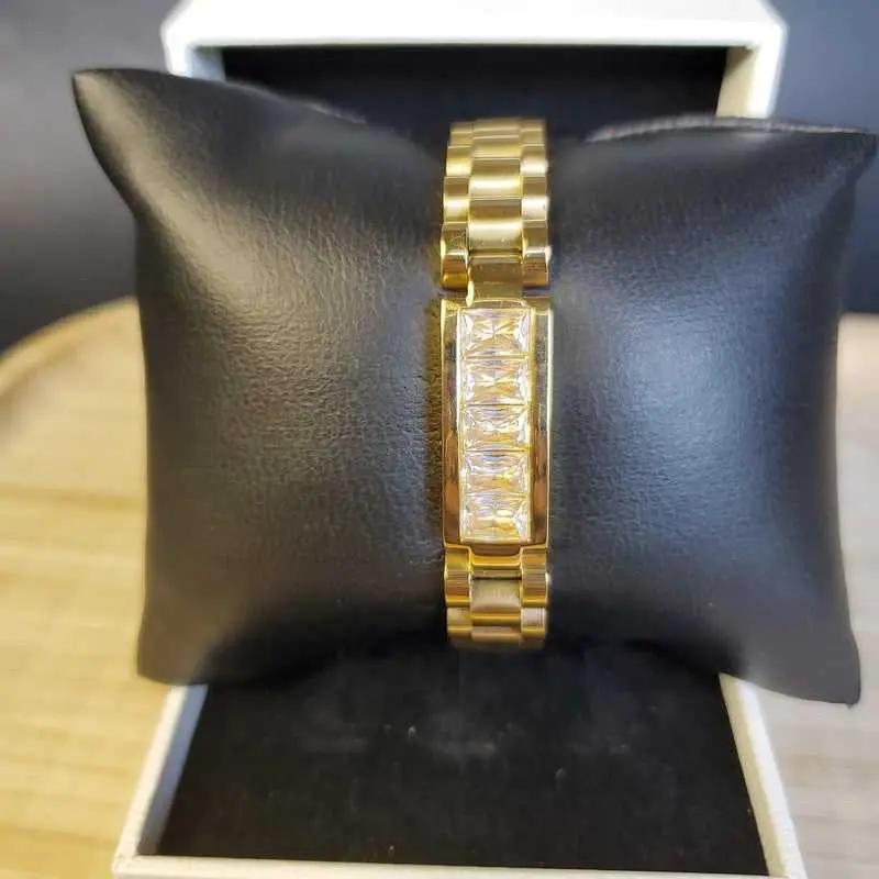 Luxury Bracelet in Gold finish on a black velvet pillow