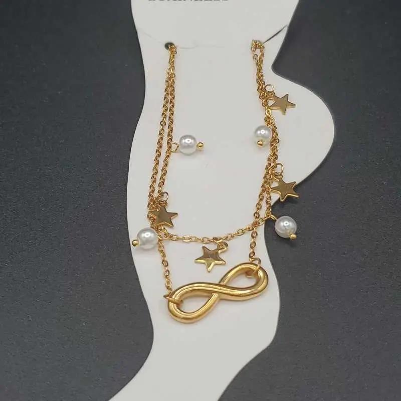 Minimalist Infinity Anklet in Gold finish, with pearl stone on a neutral background