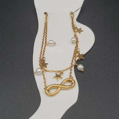 Minimalist Infinity Anklet in Gold finish, with pearl stone on a neutral background