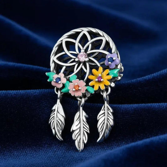 Modern Dream Catcher Charm in Silver finish, with cubic zirconia stone on a neutral background