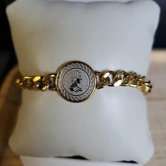 Modern Elizabeth Bracelet in Gold and Silver finish on a neutral background