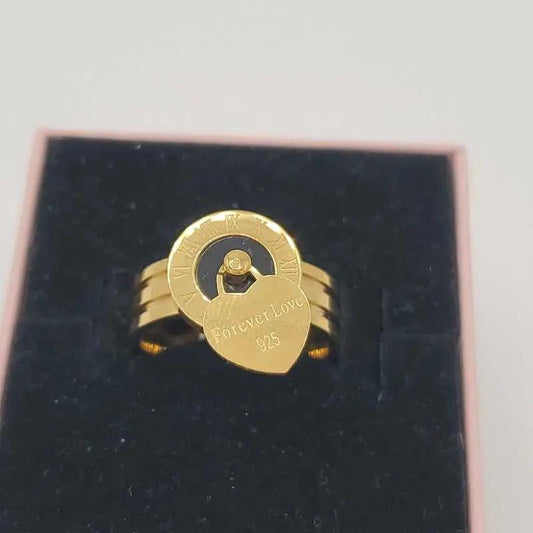 Modern Latin Number Ring in Gold finish on a neutral background