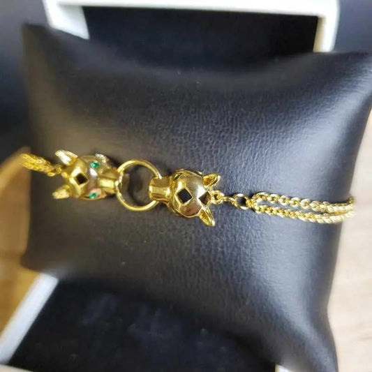 Modern Leopard Bracelet in Gold finish on a neutral background