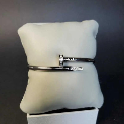Modern Stones Nail Bangle in Silver finish, with cubic zirconia stone on stones