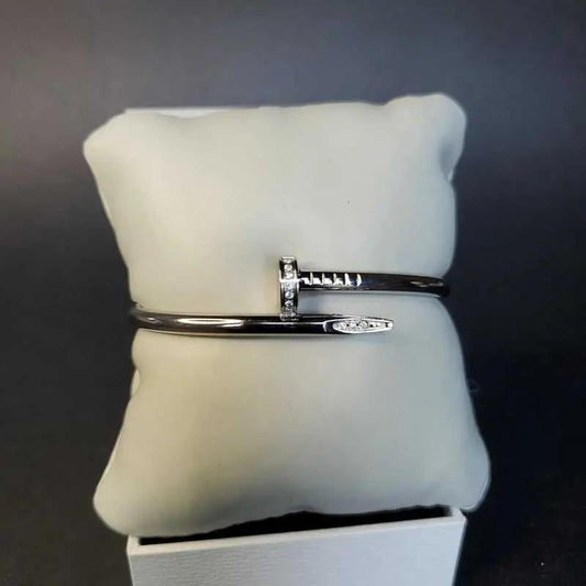 Modern Stones Nail Bangle in Silver finish, with cubic zirconia stone on stones