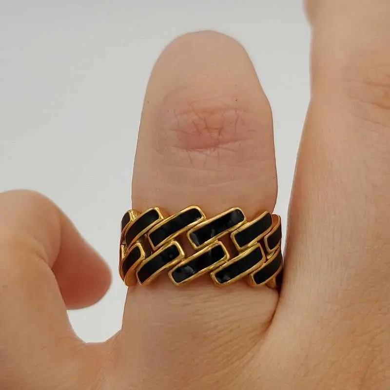 Sophisticated Enamel Ring in Gold finish on a neutral background