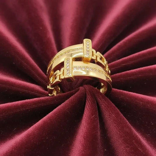 Square Chain Ring in Gold finish, with cubic zirconia stone on stones on a rich velvet background